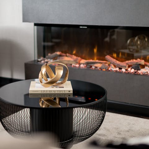 Warm up by the modern fireplace when the Scottish weather turns colder