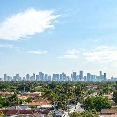 Catch a glimpse of the city skyline from your balcony