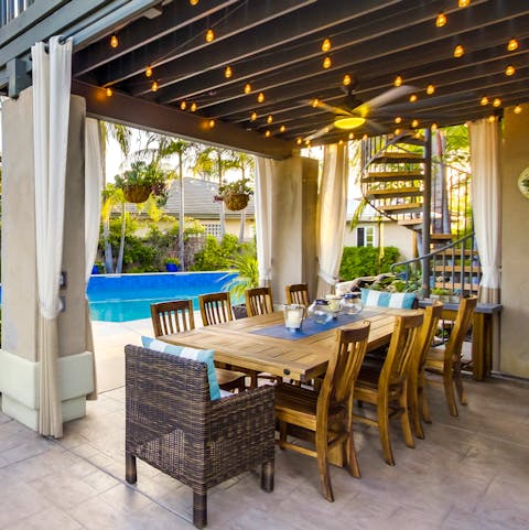 Dine alfresco under the picturesque festoon lights