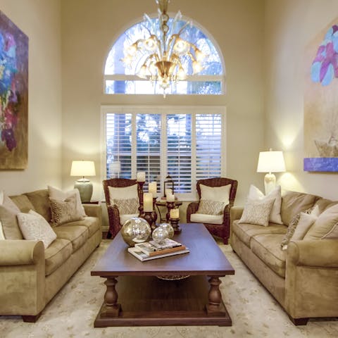Sprawl out in the grand living room with ornate furnishings