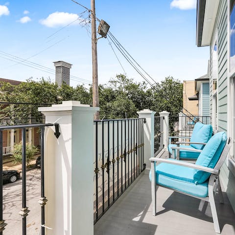 Sit on the balcony and relax with an iced tea