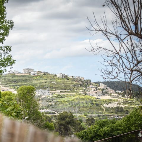 Soak up the views of Yaffe Nof's rolling green hillsides from the gardens