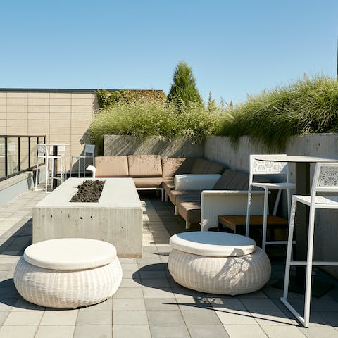 Socialise around the fire pit on the shared roof