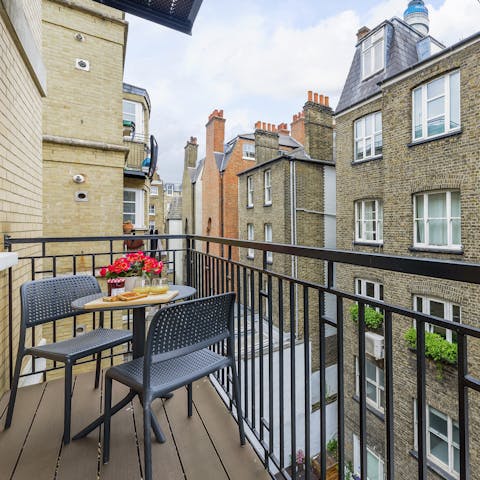 Enjoy breakfast on the balcony before exploring London