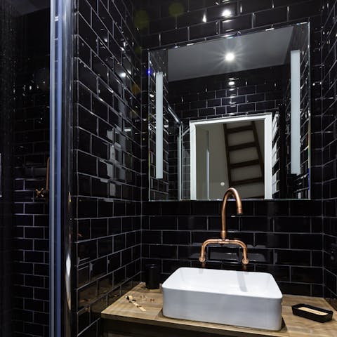 Get all dressed up in the glamorous black bathroom