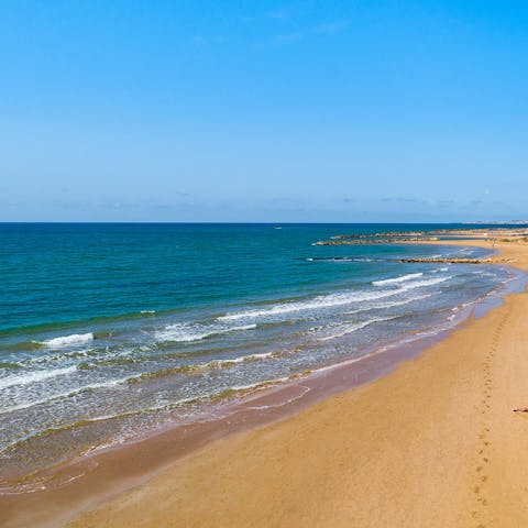 Stretch out on Palo Bianco Beach, just 20 metres from your doorstep