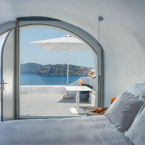 Wake up to beautiful ocean vistas from your minimalist bedroom