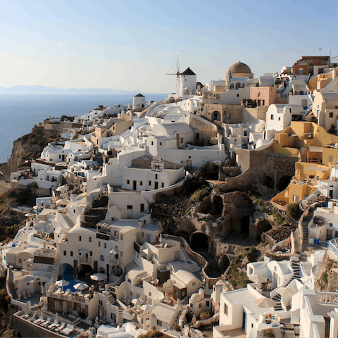 Explore the beautiful nearby town of Oia, a short drive away