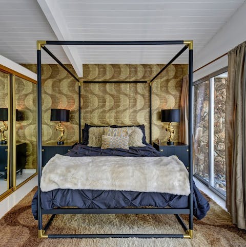 Drift off in the luxurious four-poster bed