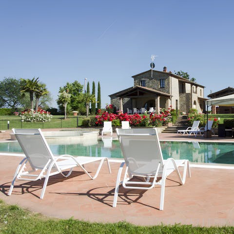 Soak up the Tuscan sun from in or beside the private pool