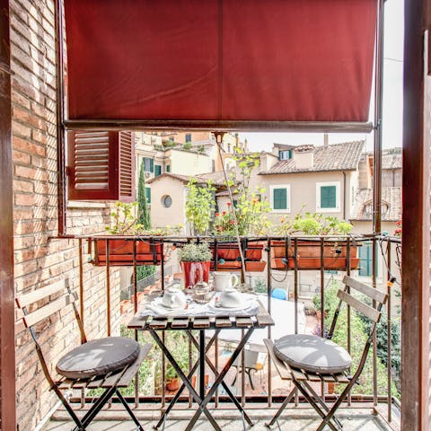 Sip a morning cappuccino on the cosy balcony