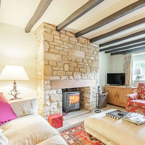 Get cosy in the characterful living room with the warmth of the fireplace  