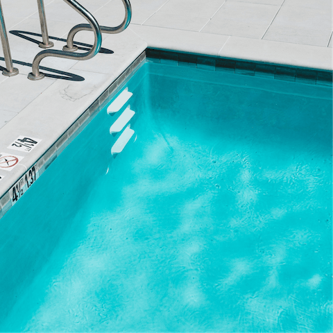 Head to the shared swimming pool to cool off in the heat of the day