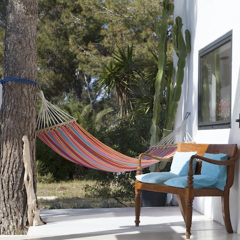 Embrace the slow pace of Ibizan life with the hammock on the terrace