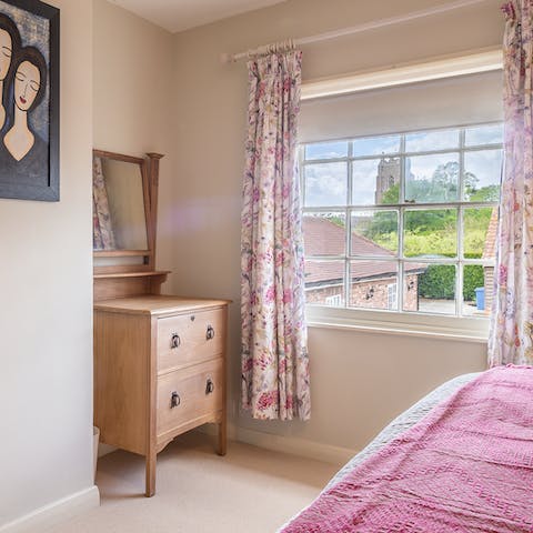 Wake up to idyllic village views from the bedroom window