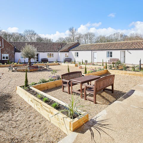 Make the most of bursts of sunshine out in the communal courtyard