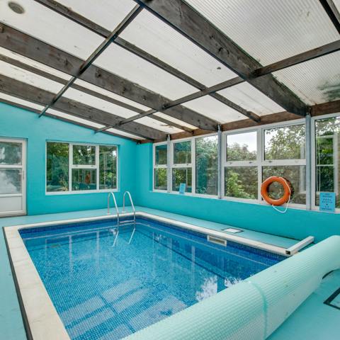 Splash around in the heated indoor pool