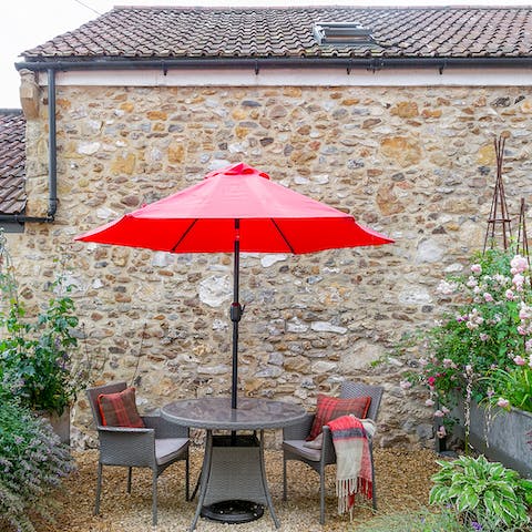Enjoy afternoon tea on the cute table in the garden