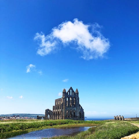 Visit the storied ruins of Whitby Abbey, a thirteen-minute walk away