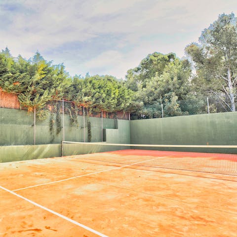 Burn off some pent up energy by playing a game of tennis