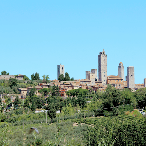 Explore San Gimignano with its iconic towers, 7.6km away