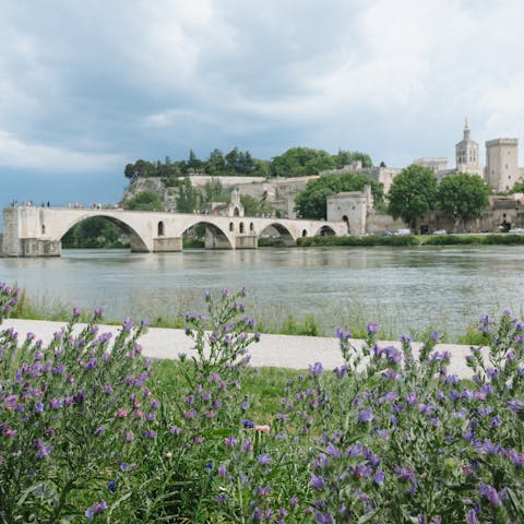 Visit the medieval Pont Saint-Benezet that once crossed the Rhône