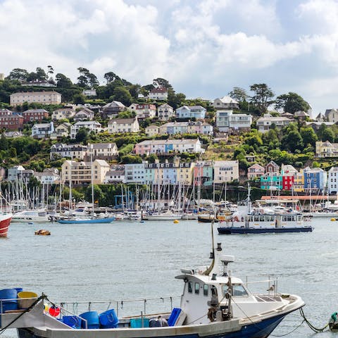 Watch the boats to and fro from Dartmouth Harbour, a minute's walk away