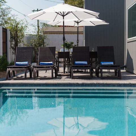 Soak up the sunshine from the poolside