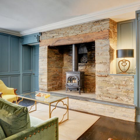 The fireplace is a focal point of this historic home