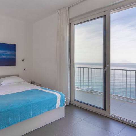 Enjoy beautiful views across the sea whilst relaxing in the bedroom