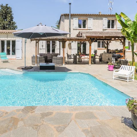 Take a dip in the glistening pool and enjoy alfresco feasts with your loved ones