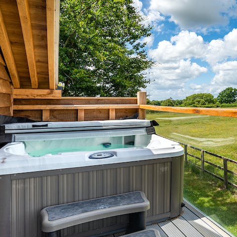 Sit back and relax in your private hot tub on the balcony