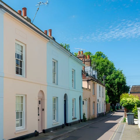 Stay in a pretty pastel cottage dating back to the 1800s