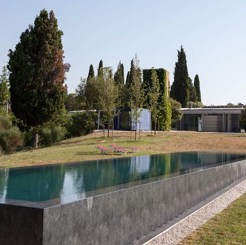 Relax beside the mirror-like pool