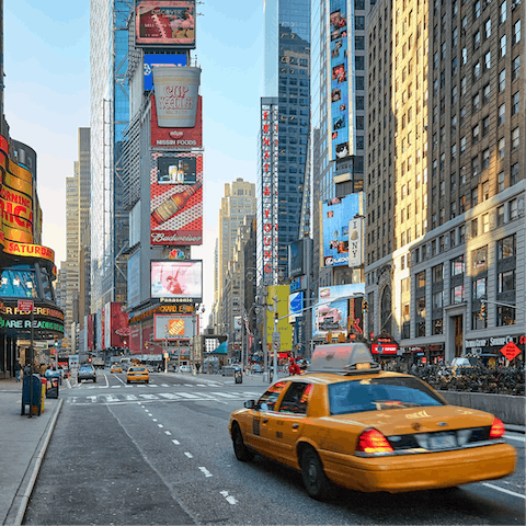 Get lost in the hustle and bustle of Times Square, a short walk away