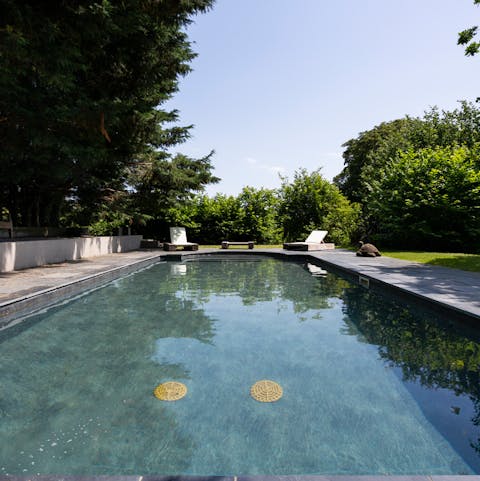 Plunge into the outdoor pool