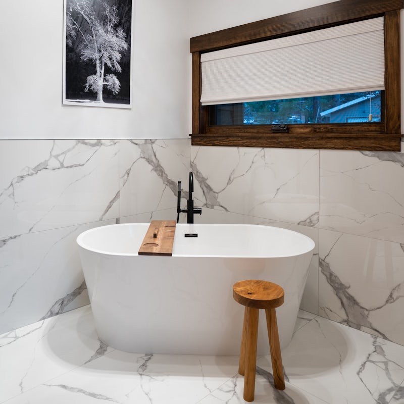 Soak in the deep freestanding tub