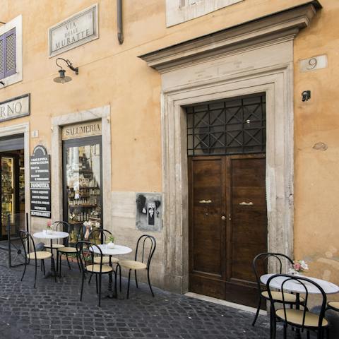 Stay in a historic Roman building with a café (literally) on your doorstep