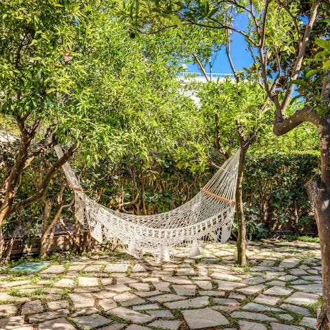 Doze off in the hammock on warm afternoons