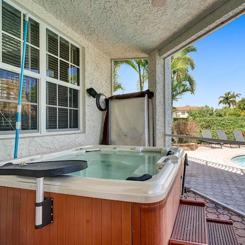 Soak in the hot tub on the covered veranda