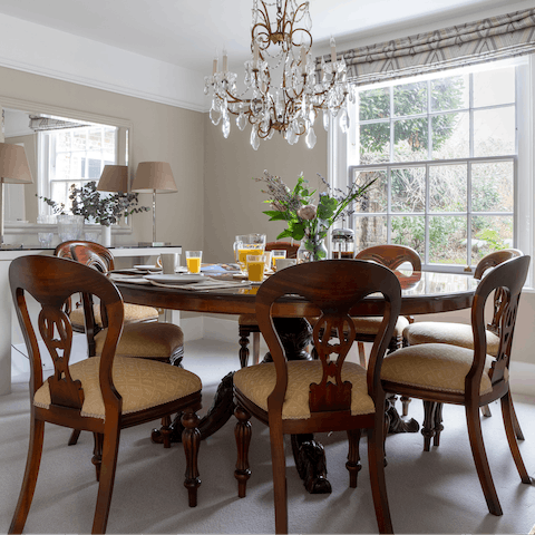 Enjoy an evening meal with friends round the regal lacquer dining table