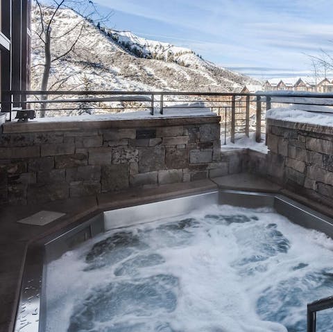 Warm up in the communal hot tub and admire the fabulous views 