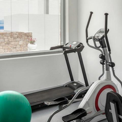 Keep up with your routine in the home fitness room