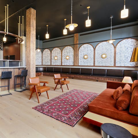 Relax in the swish apartment lobby and meet some of your fellow travellers