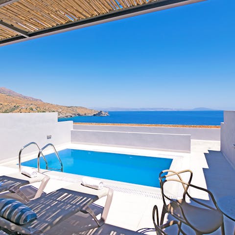 Enjoy uninterrupted sea views from your private poolside terrace