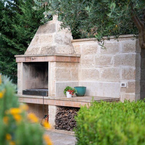Get the fire going in the stone barbecue so you can enjoy a chargrilled lunch