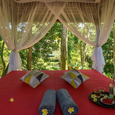 Escape to the joglo-style pavilion for a rejuvenating Balinese massage