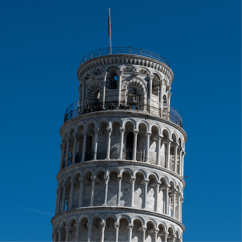 Visit the Leaning Tower of Pisa, just a twenty-minute drive away