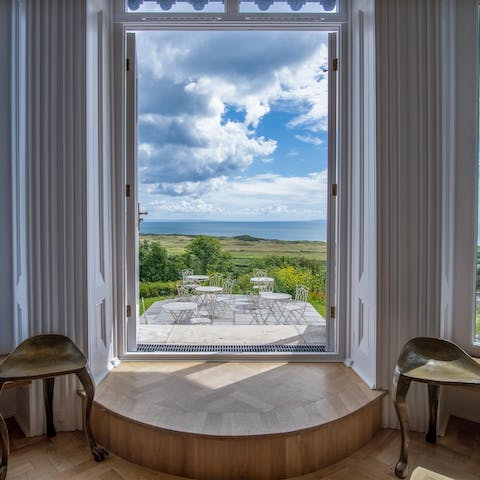 Admire the view from huge bay windows in the lounge