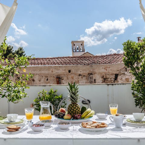 Share antipasti and wine on the balcony table